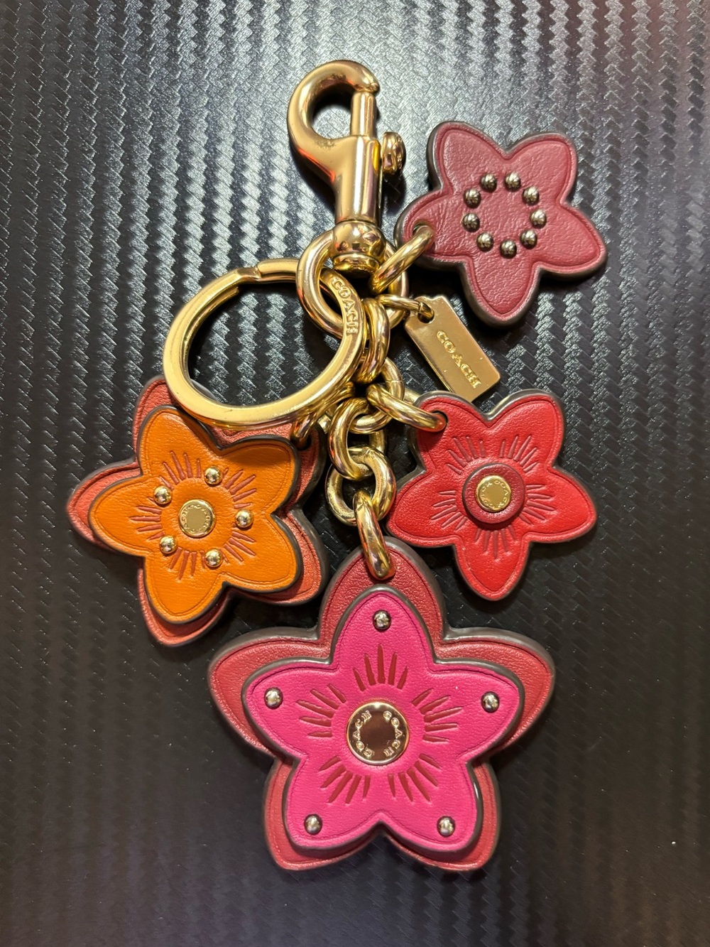 Coach Wildflower Mix Bag Charm, a popular leather keychain and purse accent.